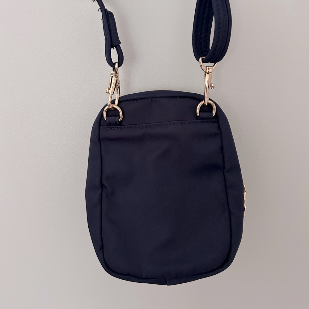 Travelon Anti-Theft Tailored Crossbody Phone Pouch - Sapphire, gold accents - Picture 8 of 11